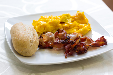 Scrambled eggs and baconの写真素材