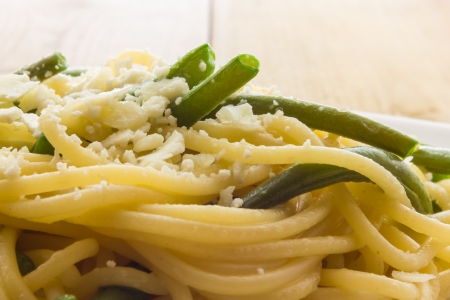 Spaghetti with garlic oil and green beans from Italyの写真素材