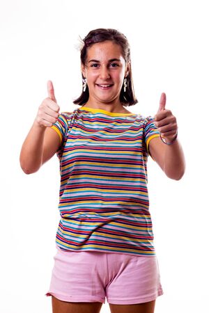 little girl with thumbs upの写真素材