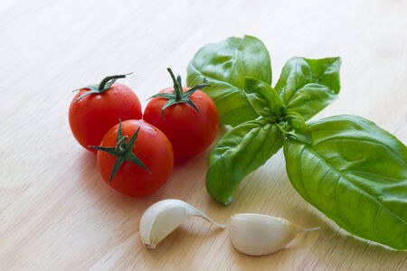 Close up view of bruschetta and ingredientsの写真素材