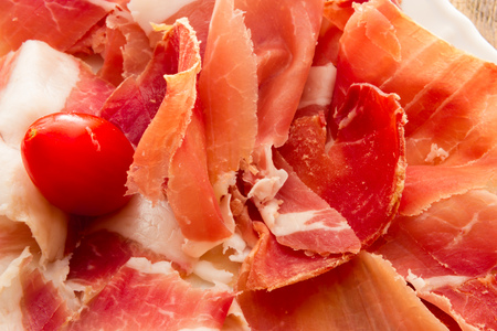 Real pork ham from Italy Bolognaの写真素材