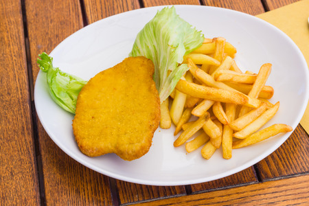 Cutlet with chipsの写真素材