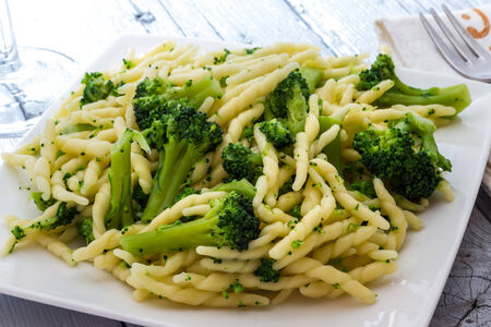 Italian pasta named Trofie with broccoliの写真素材