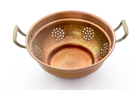 old copper colanderの写真素材
