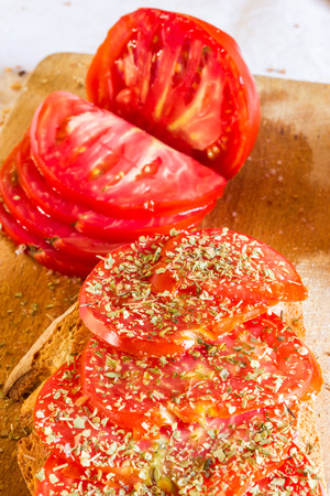 Bread with tomato and basilの写真素材