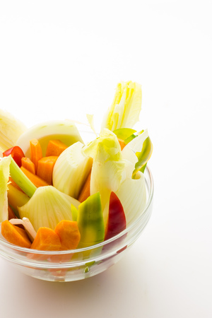 Raw vegetables in a bowlの写真素材