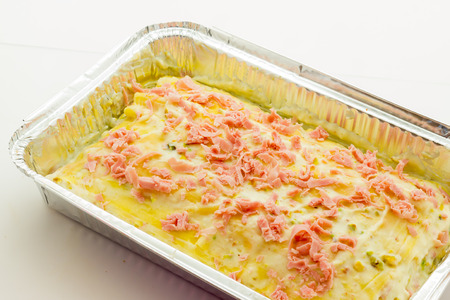 Lasagna with ham and pistachios ready to bakeの写真素材