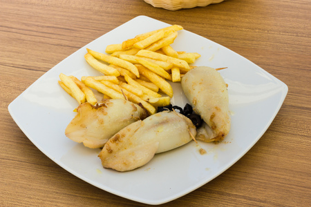 Stuffed cuttlefish and chipsの写真素材