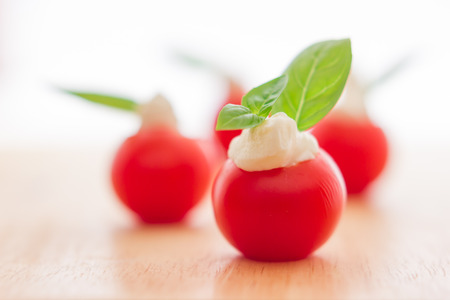 Cherry tomatoes with soft cheeseの写真素材