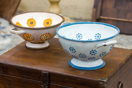 vintage colander in a flea marketの写真素材