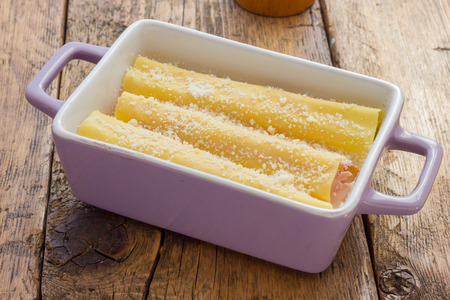 Cannelloni baked with ham and cheeseの写真素材