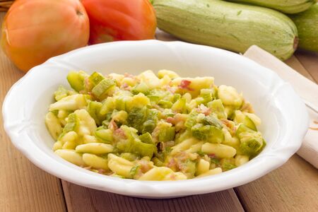 Cavatelli pasta with bacon and courgettesの写真素材