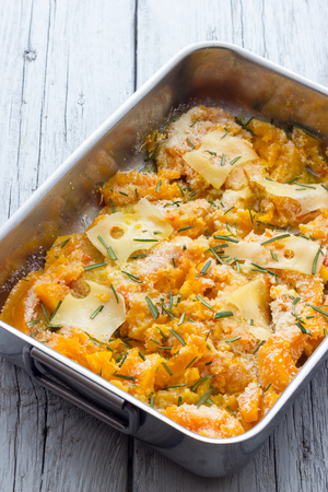 Cooking pumpkin baked with cheeseの写真素材