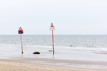 Signs on the beachの写真素材