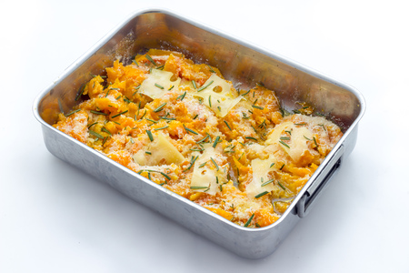 Cooking pumpkin baked with cheeseの写真素材