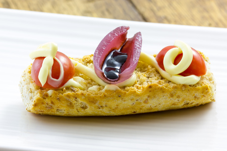 Tasty appetizer of canapes and vegetables