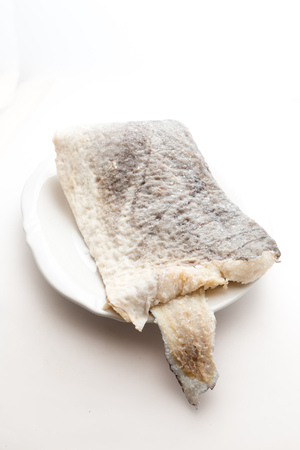 Slice of raw salted codfishの写真素材