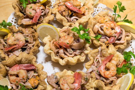 Appetizers Fish Baskets with cuttlefishの写真素材