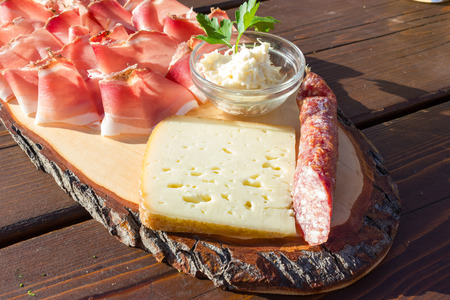Speck salami and cheese with horseradish sauceの写真素材