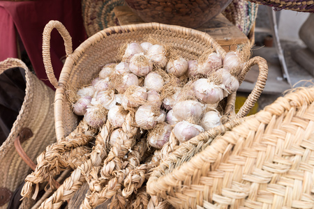 Baskets full of garlicの写真素材