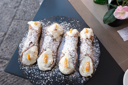 Sicilian cannoli with ricotta and candiedの写真素材