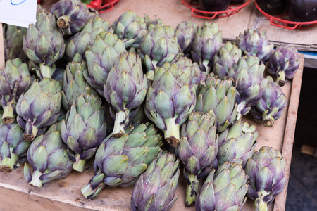 Artichokes on the market benchの写真素材