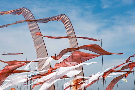Kites with blue sky and white cloudsの写真素材