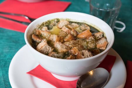 Trentino vegetable soup with melted cheeseの写真素材