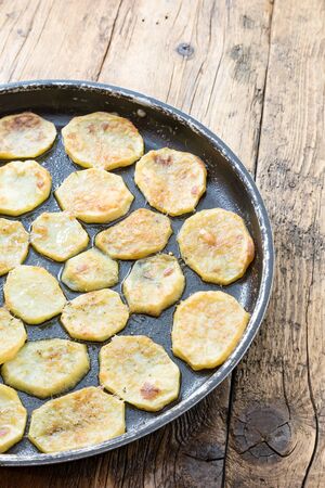 Fried potatoes in the ovenの写真素材