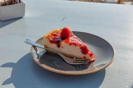 Slice of raspberry semifreddo cakeの写真素材