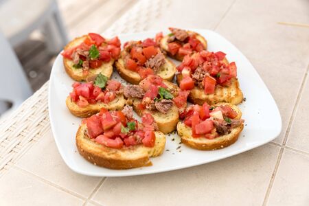 Appetizer of bruschetta with tunaの写真素材