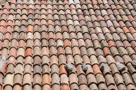 Detail of terracotta roof tilesの写真素材