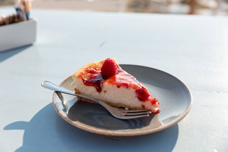 Slice of raspberry semifreddo cakeの写真素材