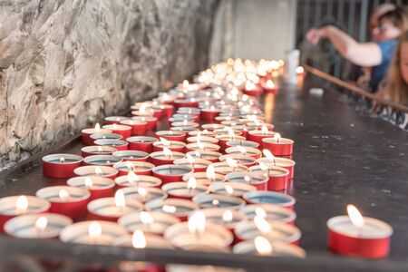 Candles lit in the churchの写真素材
