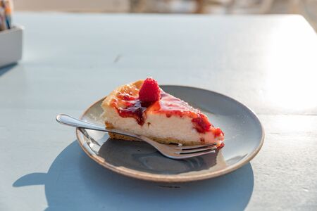 Slice of raspberry semifreddo cakeの写真素材