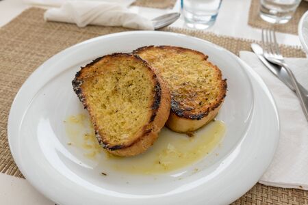 Bread toasted with garlic and oilの写真素材