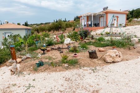 Typical stone garden on the island of Kefaloniaの写真素材