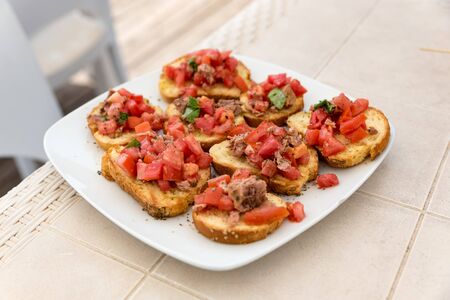 Appetizer of bruschetta with tunaの写真素材