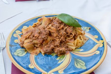 Tagliatelle with Sicilian raguの写真素材