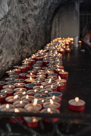 Candles lit in the churchの写真素材