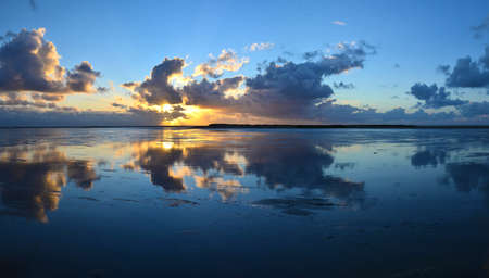 Sunset with reflection on water