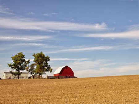 Tilled Field with Red Barnのeditorial素材