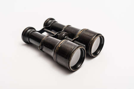 Vintage binoculars on a white backgroundの写真素材