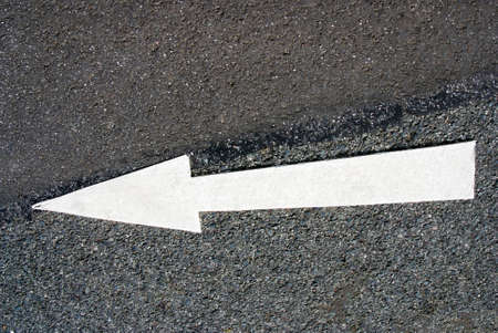 Directional Arrow on Asphaltの写真素材