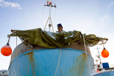 Fishing boat in Denmark at the beachの写真素材