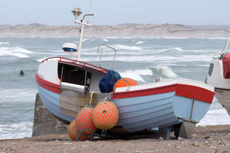 Danish fishing boat on the beachの写真素材