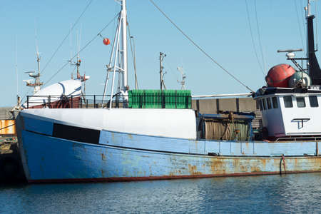 Fishing boat in the harbor of Hanstholm Denmarkの写真素材