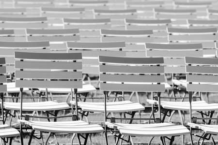 White chair rows in a spa park in Black & White medium lightの写真素材