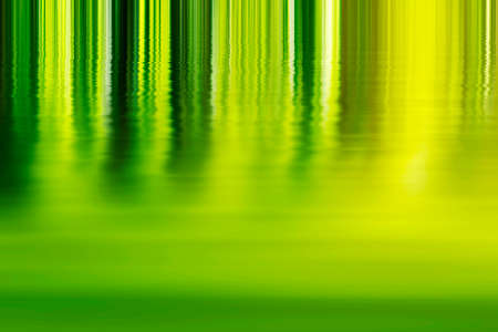 Shadow and light - abstract green background on a water surfaceの写真素材