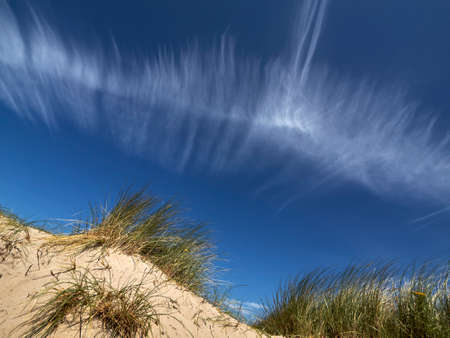 Dunluce Castle, County Antrim, under a beautiful rainbowの写真素材